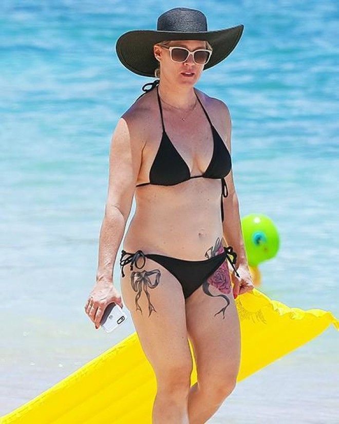 Jennie Garth Sports Massive New Rose Tattoo on Hip in Tiny Black Bikini.
