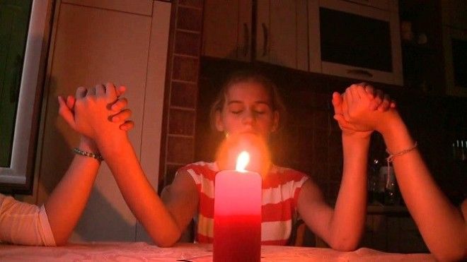 calling the ghost with candles