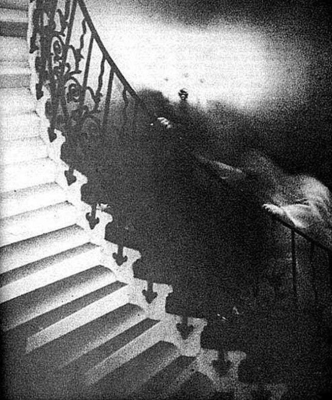 The Photographer Only Saw The ... is listed (or ranked) 1 on the list It's Been Over 50 Years And People Still Can't Debunk This Photo Of A Ghost On The Tulip Staircase