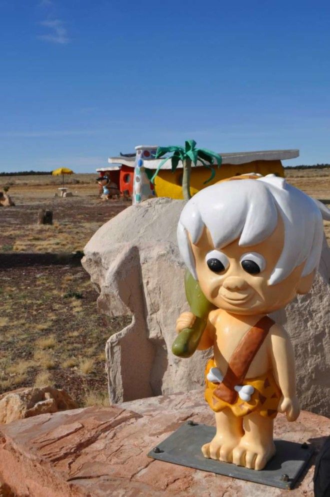 A statue of Bam-Bam at the Flintstones park in Arizona