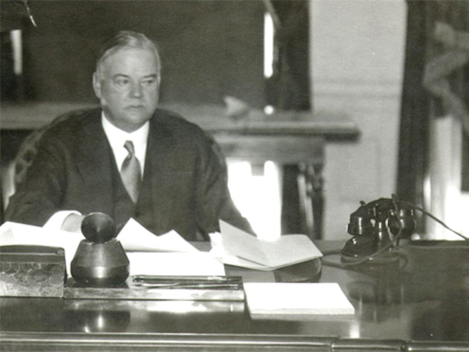 Herbert Hoover's desk was aflutter with papers in 1932.