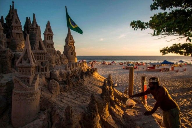 Marcio maintains his sand castle abode