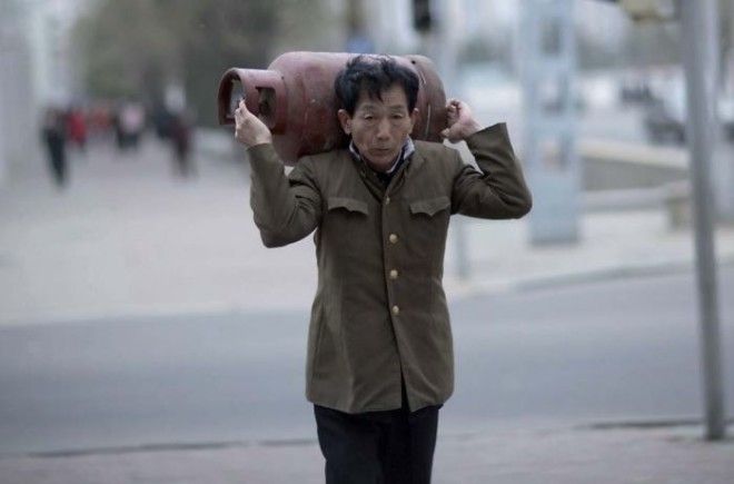 It Is Forbidden To Take Pictures Of The Daily Life Of The North Korean People If They Are Not Well Dressed. For My Guide This Man Was Not Well Dressed Enough To Be Photographed