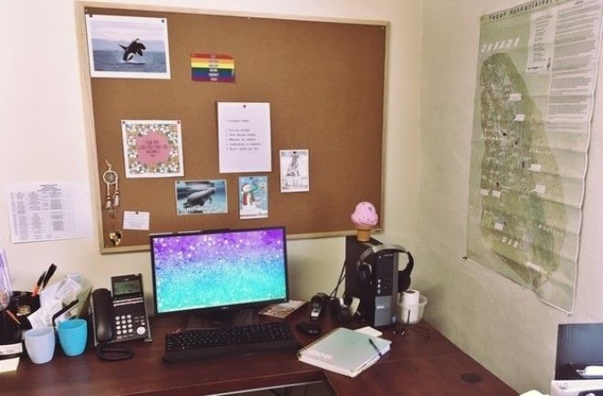 I work with adults and kids, so I try to keep a balance of professionalism, comfort, and whimsy. The ice cream cone is a stress squishy, my agenda is holographic (thanks, ban.do), and my cork board has inspiring art and photos. The map is the First Nations traditional territory that I live and work in. —starf