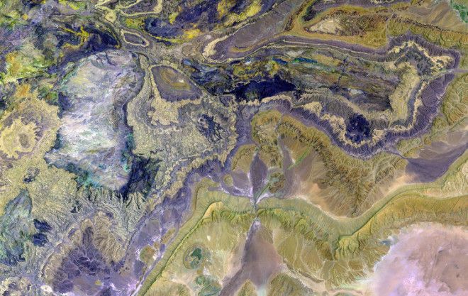 Pictured here are the Anti-Atlas mountains, a subset of the Atlas Mountain range in southern Morocco, Africa. This false color image depicts some of the world's largest and most diverse mineral resources.