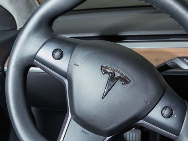 The little trackballs are controversial. This is really the only major minimalist decision in the Model 3 that's questionable.