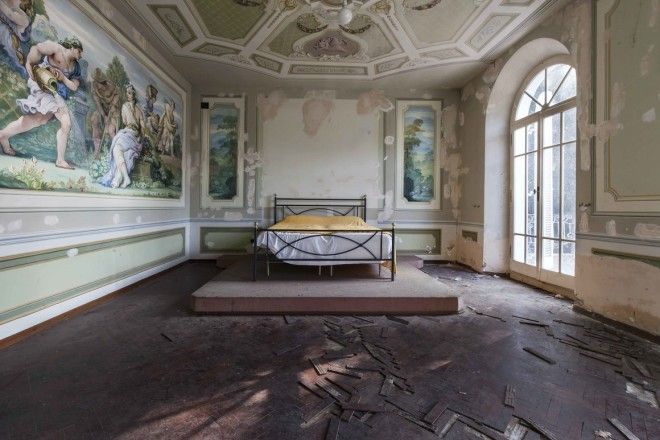 The frescoed bedroom of an abandoned villa in the Marches, central Italy. 