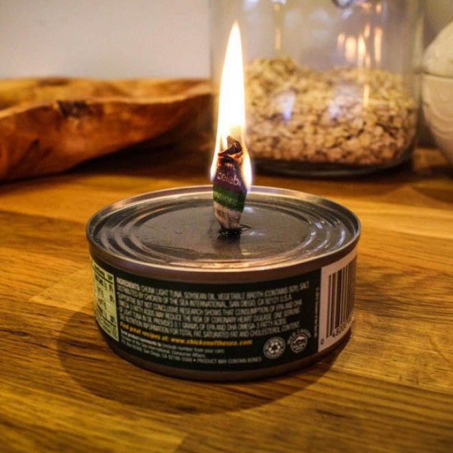 Putting a wick in a tin of tuna will provide you with candlelight for hours, and the tuna will still be fine to eat afterward. 