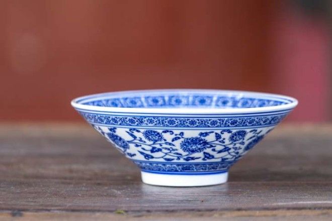 Porcelian blue and white porcelian bowl on surface
