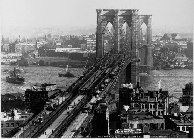 The Brooklyn Bridge is seen at the time of its completion.