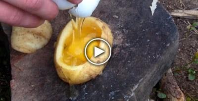 He crack egg inside Potato