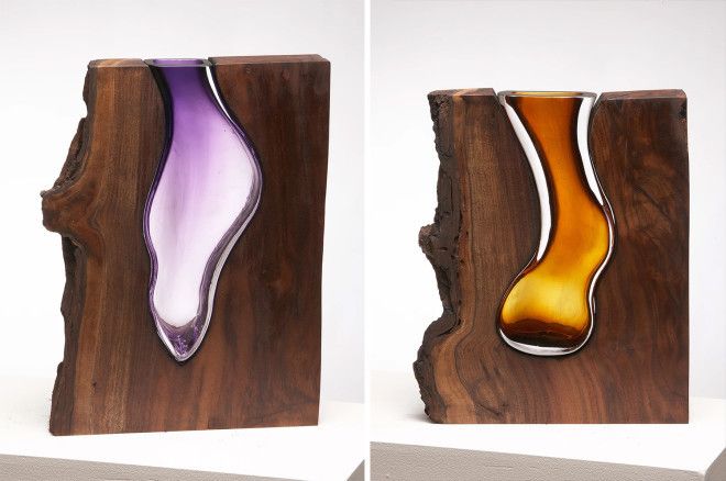 These glass vessels within beautiful shapes of wood - just gorgeous.