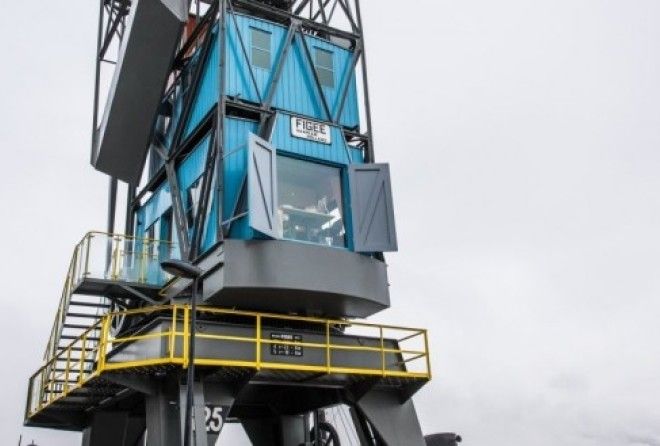 Cranes and shipping containers are being made into accommodation as the crowded Dutch capital suffers a housing shortage.
