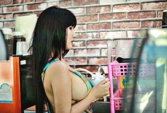 A coffee shop owner faces jail after a model stripped off and served customers in the nude.